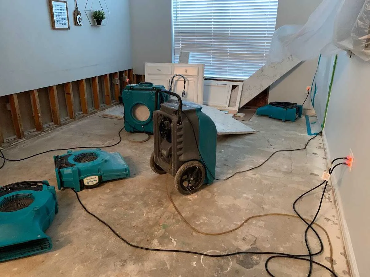 Dehumidifier in flood-cut room for Water Damage Restoration in Seguin